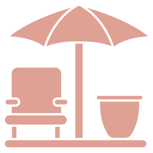 Icon of a lounge chair, a small table, and an open umbrella on a flat surface, representing an outdoor patio or relaxation area often found in retirement homes.
